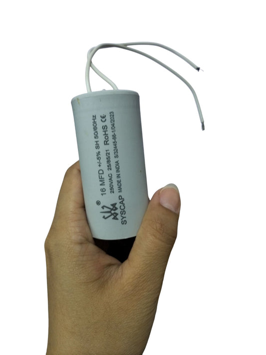 Syscap 16MFD 250V AC Running Capacitor held in hand with two connecting wires