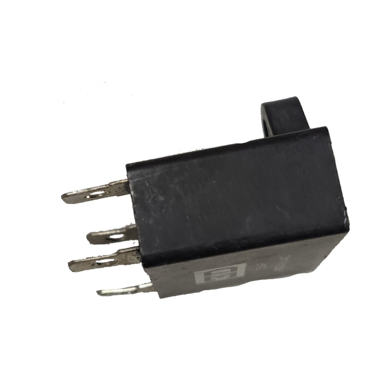 Black relay with metallic contacts on a white background