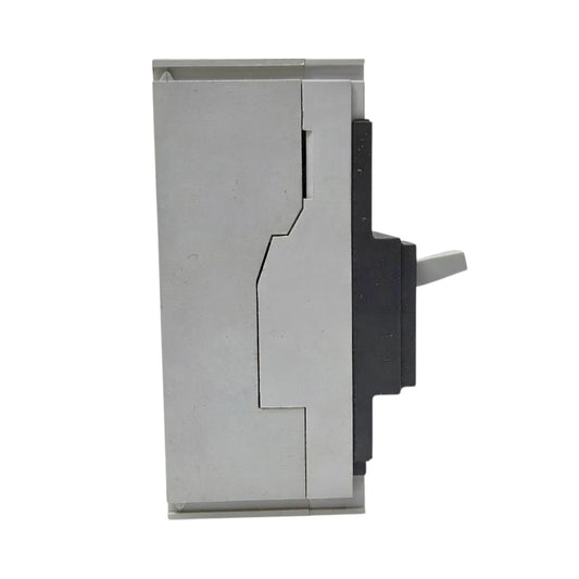 A close-up of a metallic silver and black mechanical component or switch assembly on a plain white background.