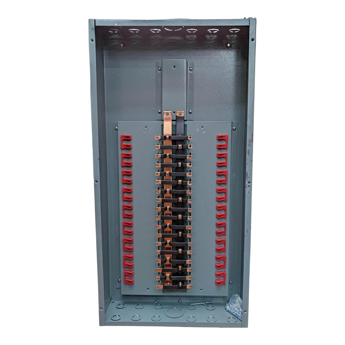 A large industrial electrical panel or breaker box shown open against a plain white background, with gray metal interior, copper bus bars, and red terminal covers.