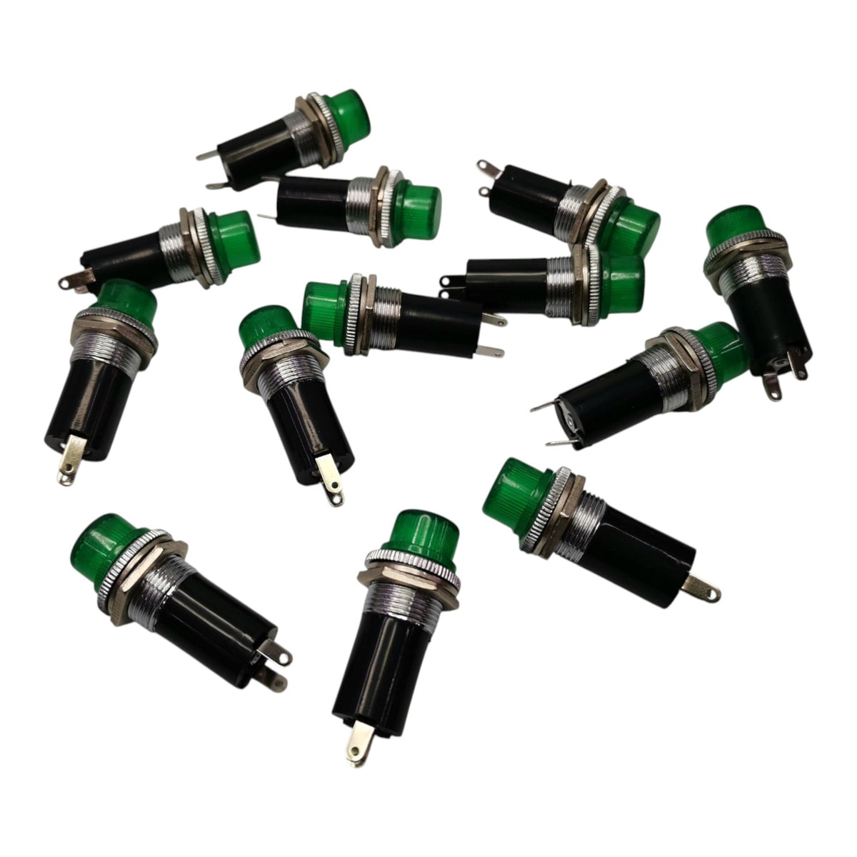 Ten green and black push-in button switches with silver metal pins, arranged on a plain white background.