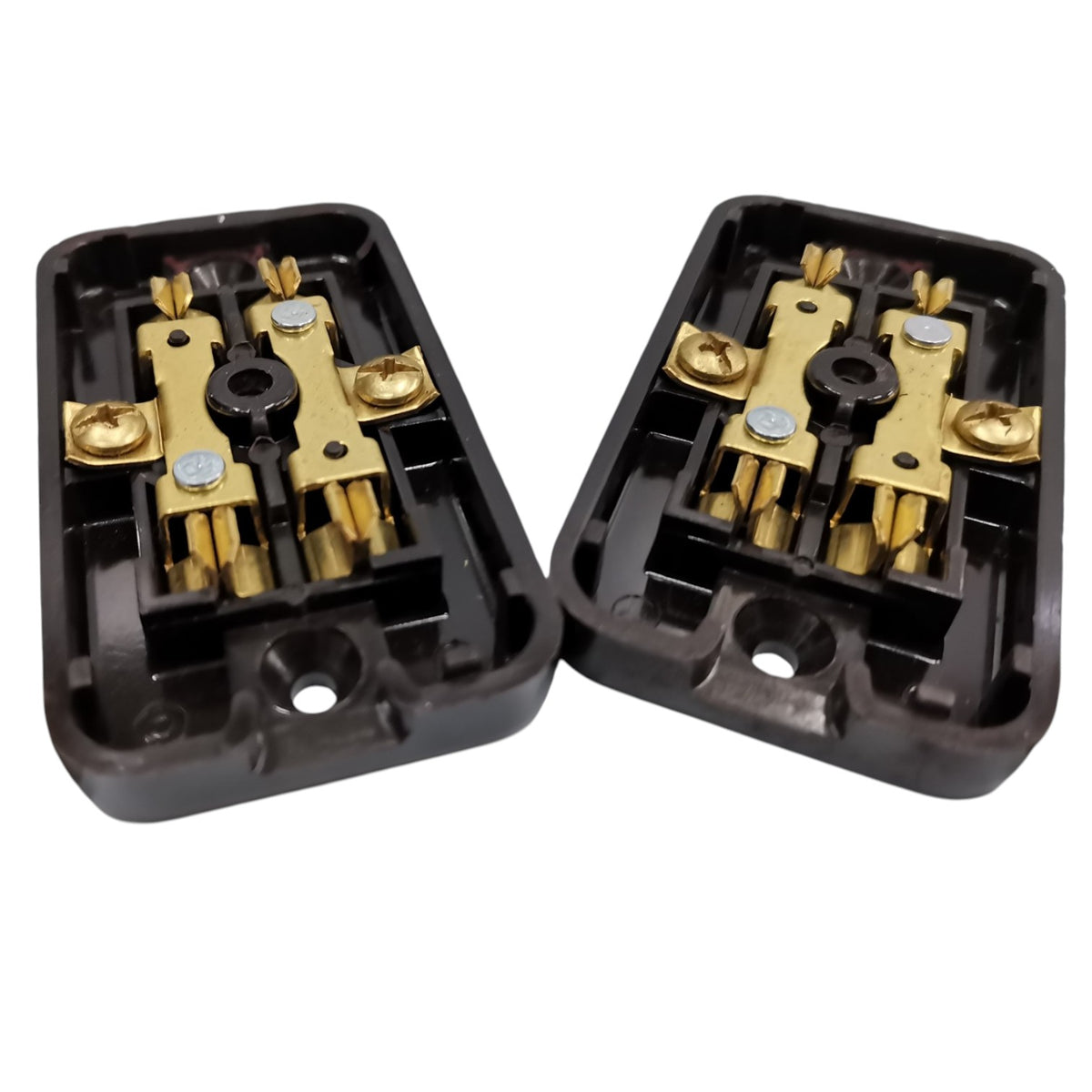 Two black electrical terminal blocks with gold-colored metal contacts, shown on a plain white background.