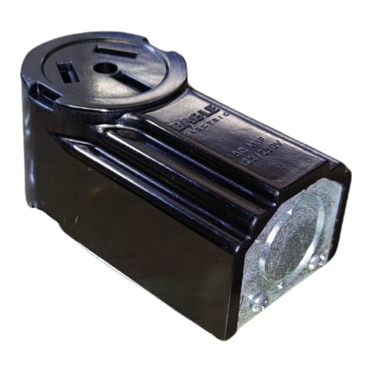 A black molded electrical outlet adapter with a silver metal grounding terminal, featuring embossed branding that reads 'BULS ELECTRIC'.