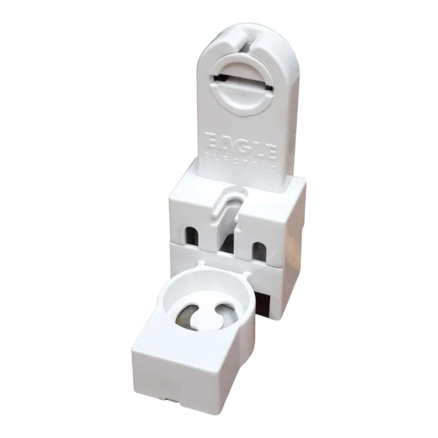 White plastic Eagle Electronics terminal block connector with a separate small white clip piece placed in front, shown on a plain white background.