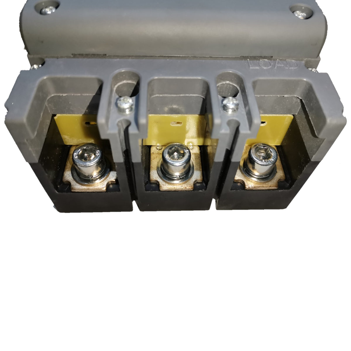 A three-terminal electrical connector or terminal block with gray plastic housing, black base sections, yellow insulating tabs, and silver screw terminals, shown on a plain white background.