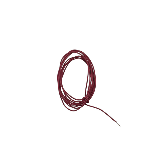 Small coil of red thread on a white background