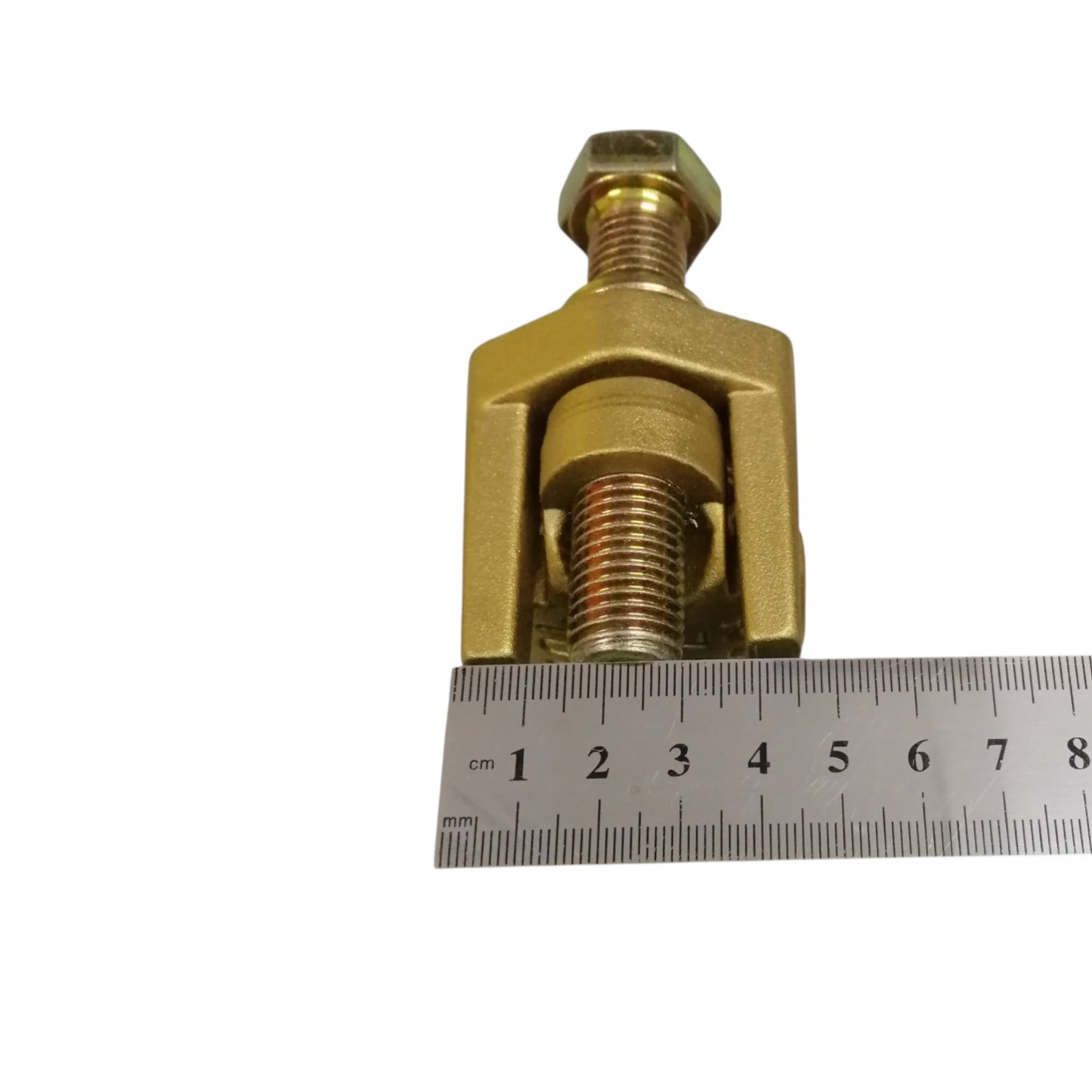 B-B Solderless Connector 2 Bolt brass clamp with hex bolts shown next to ruler for scale