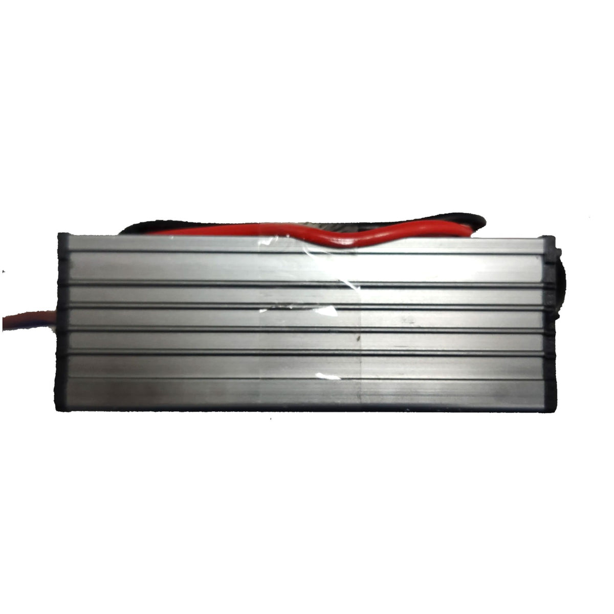 A rectangular silver metal electronic module with horizontal cooling fins, a red and black cable attached on top, and a red wire extending from the left side, shown against a plain white background.