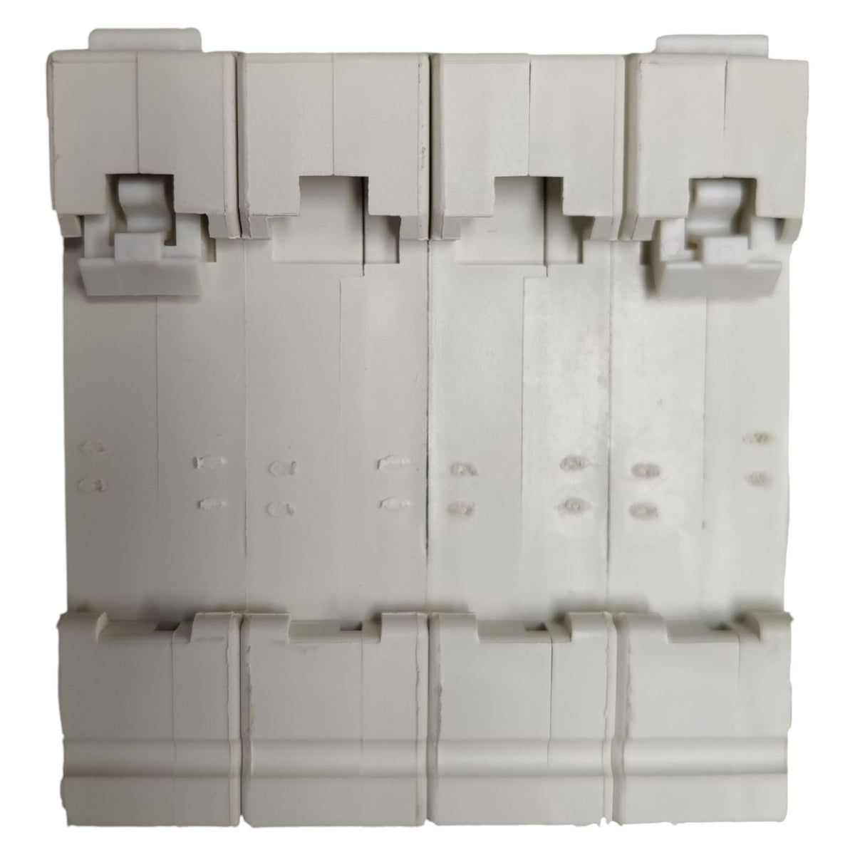 Stack of gray plastic components on a white background