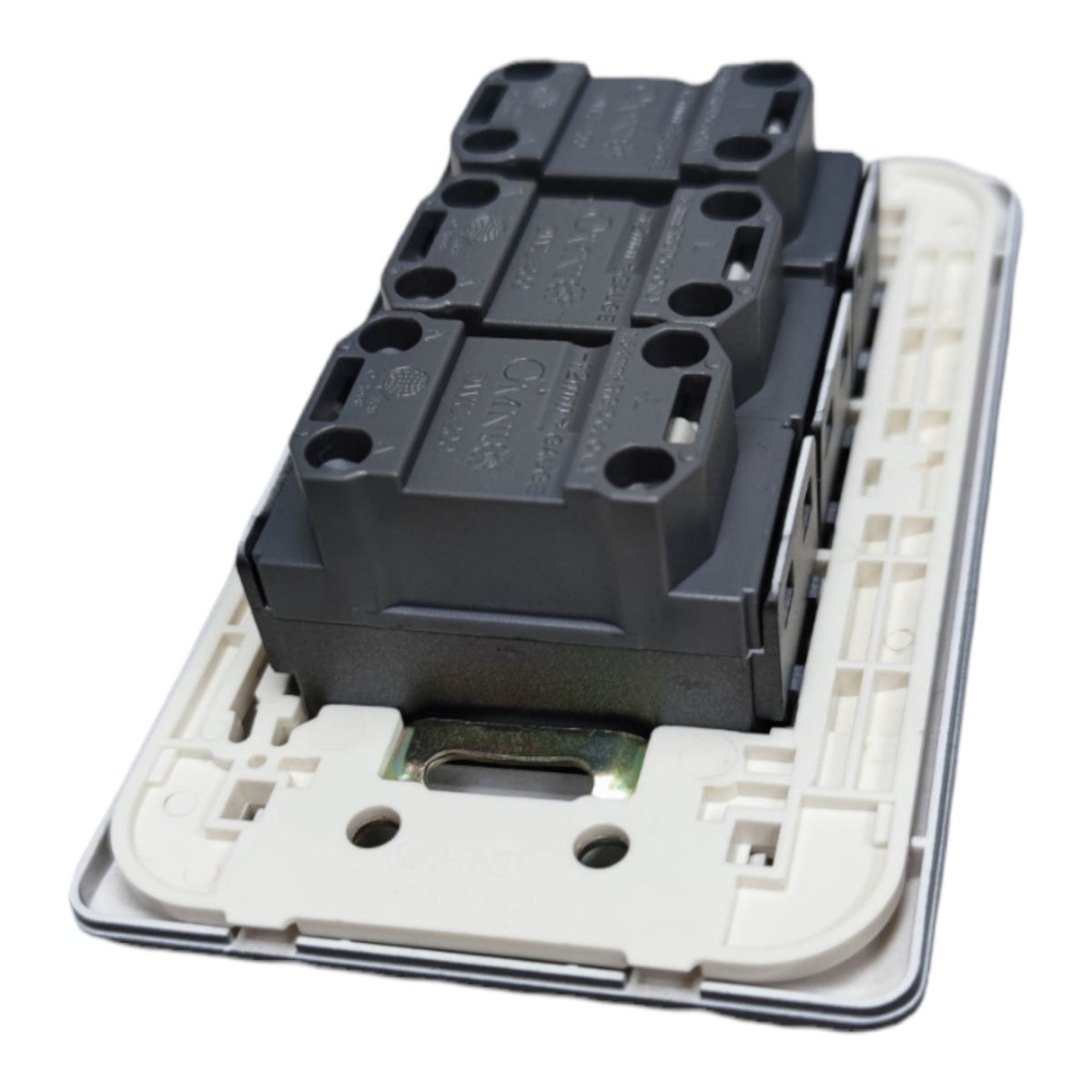 A close-up of a black electrical contact block mounted on a white plastic backplate, photographed on a plain white background.