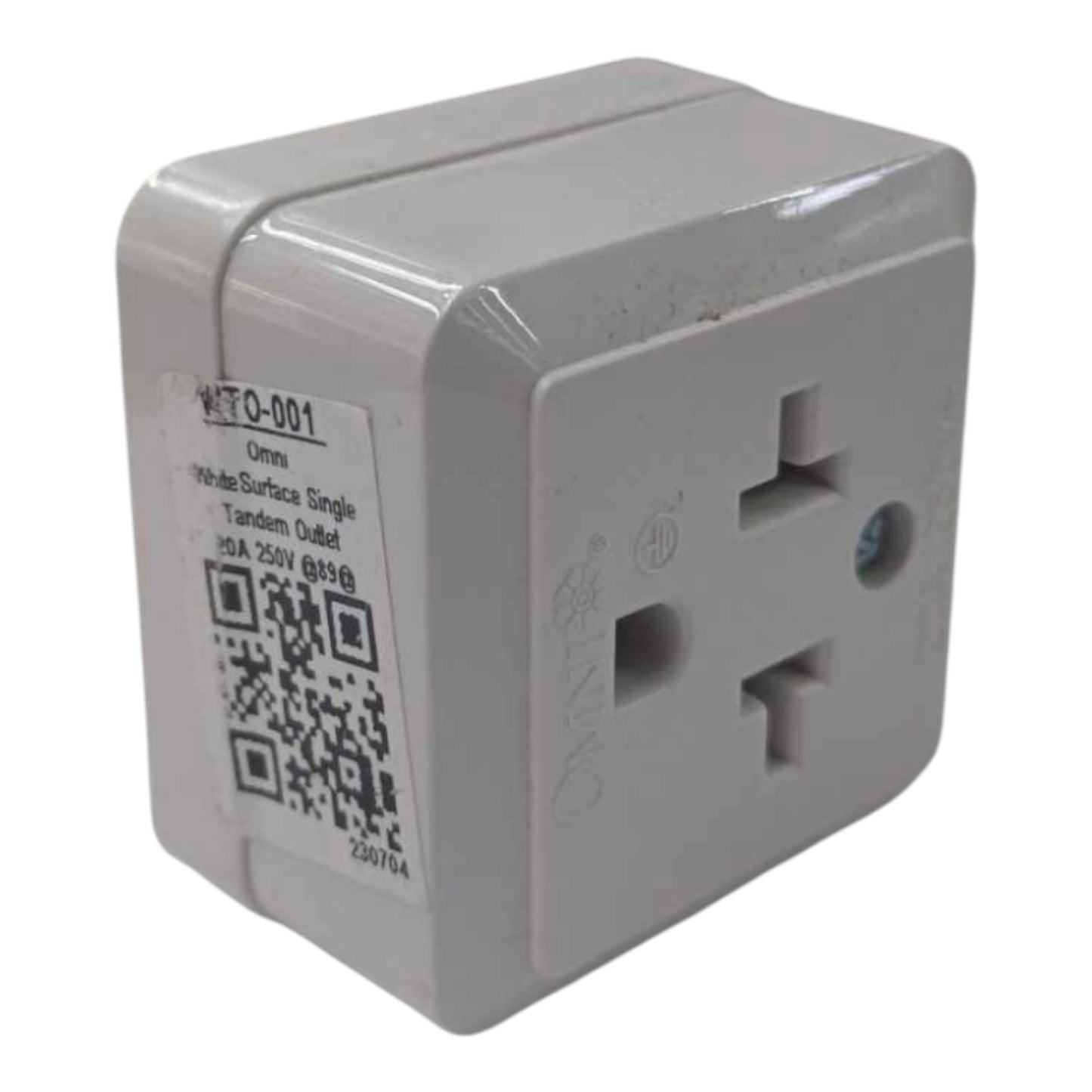 A white plastic twin-deckled single tandem outlet travel adapter with a product label on the side, shown against a plain white background.