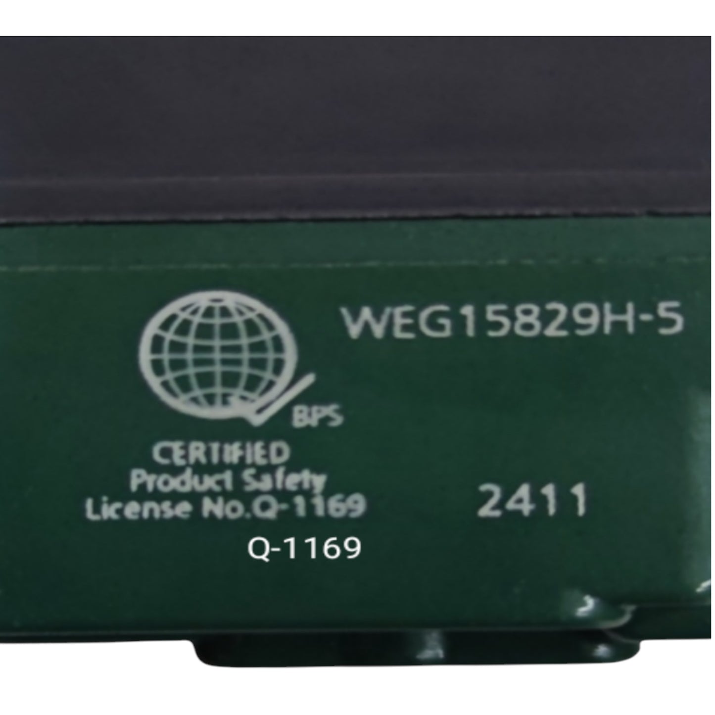 Close-up of a dark green industrial electronic module with white printed text and certification details, including 'WEG15829H-5', 'BPS Certified Product Safety', and '2411'.