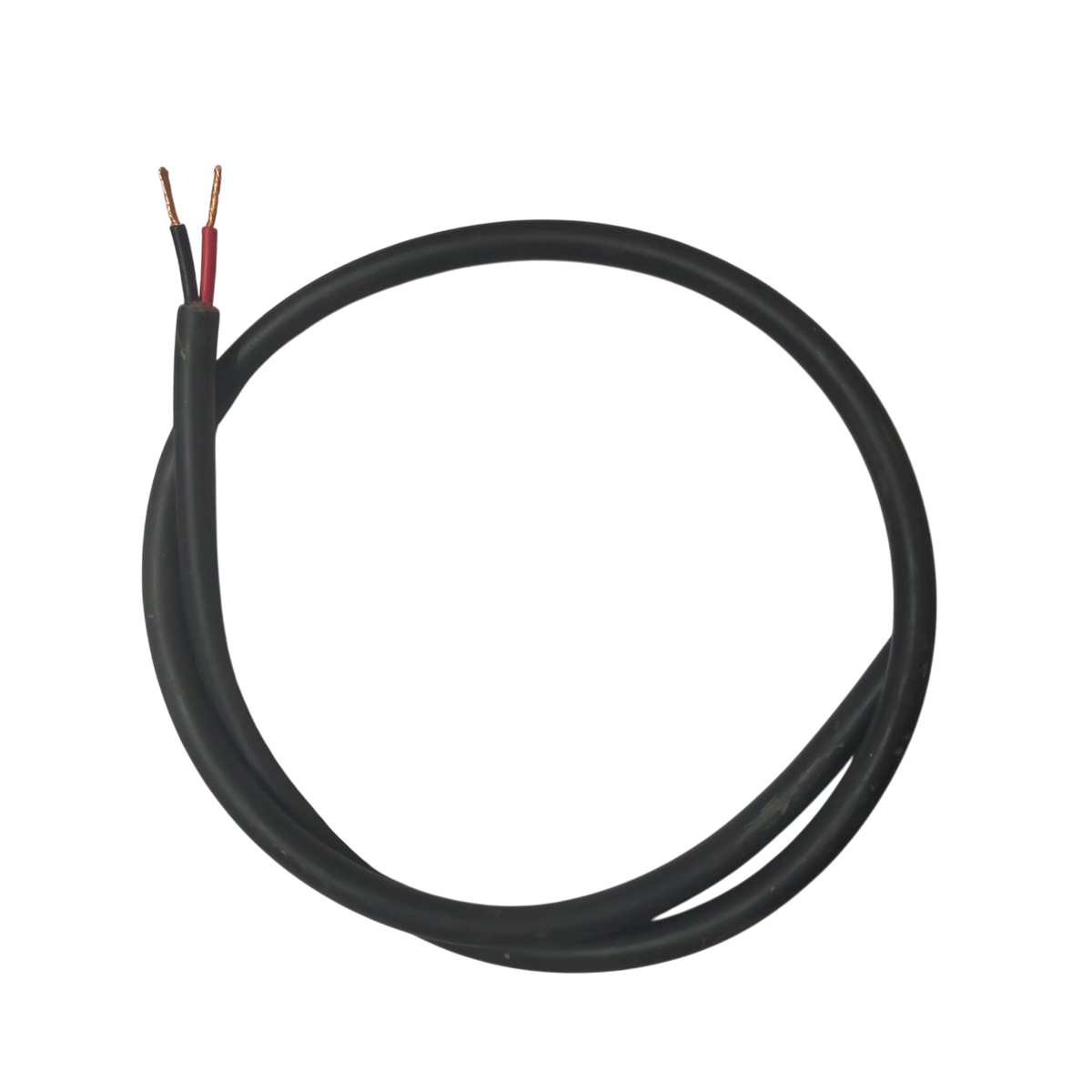 Phelps Dodge perma cord wire with black insulation and exposed copper ends on black background