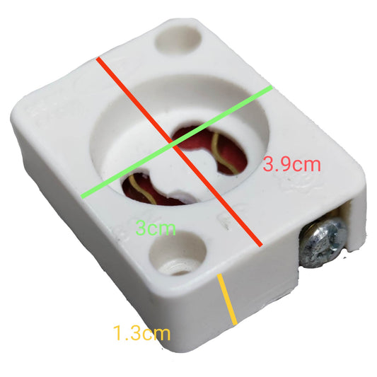 White plastic electrical terminal block with red and green measurement lines and dimension labels showing 3.9cm, 3cm, and 1.