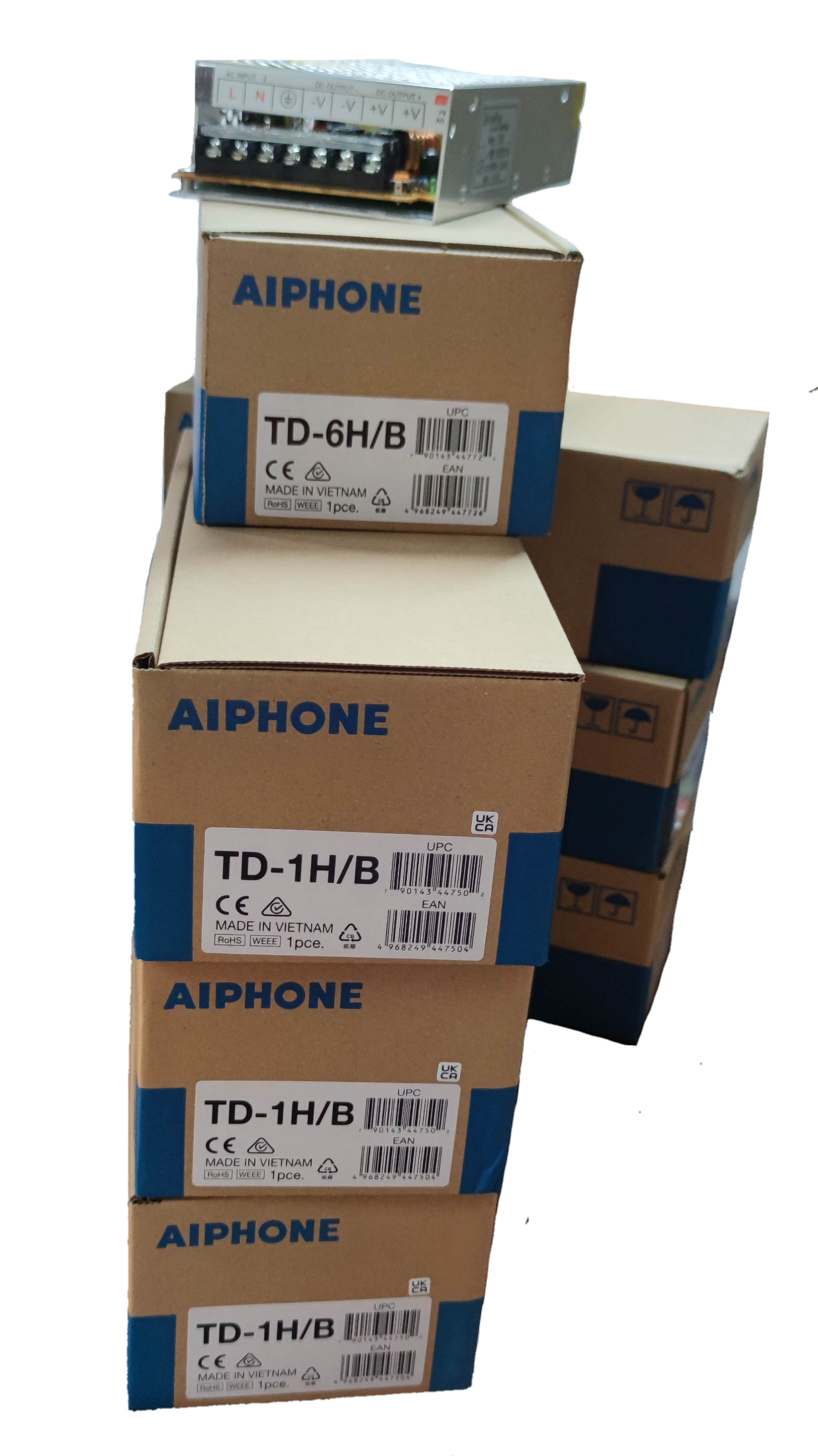 Aiphone 6 station intercom system boxes stacked with electronic component on top for security setup