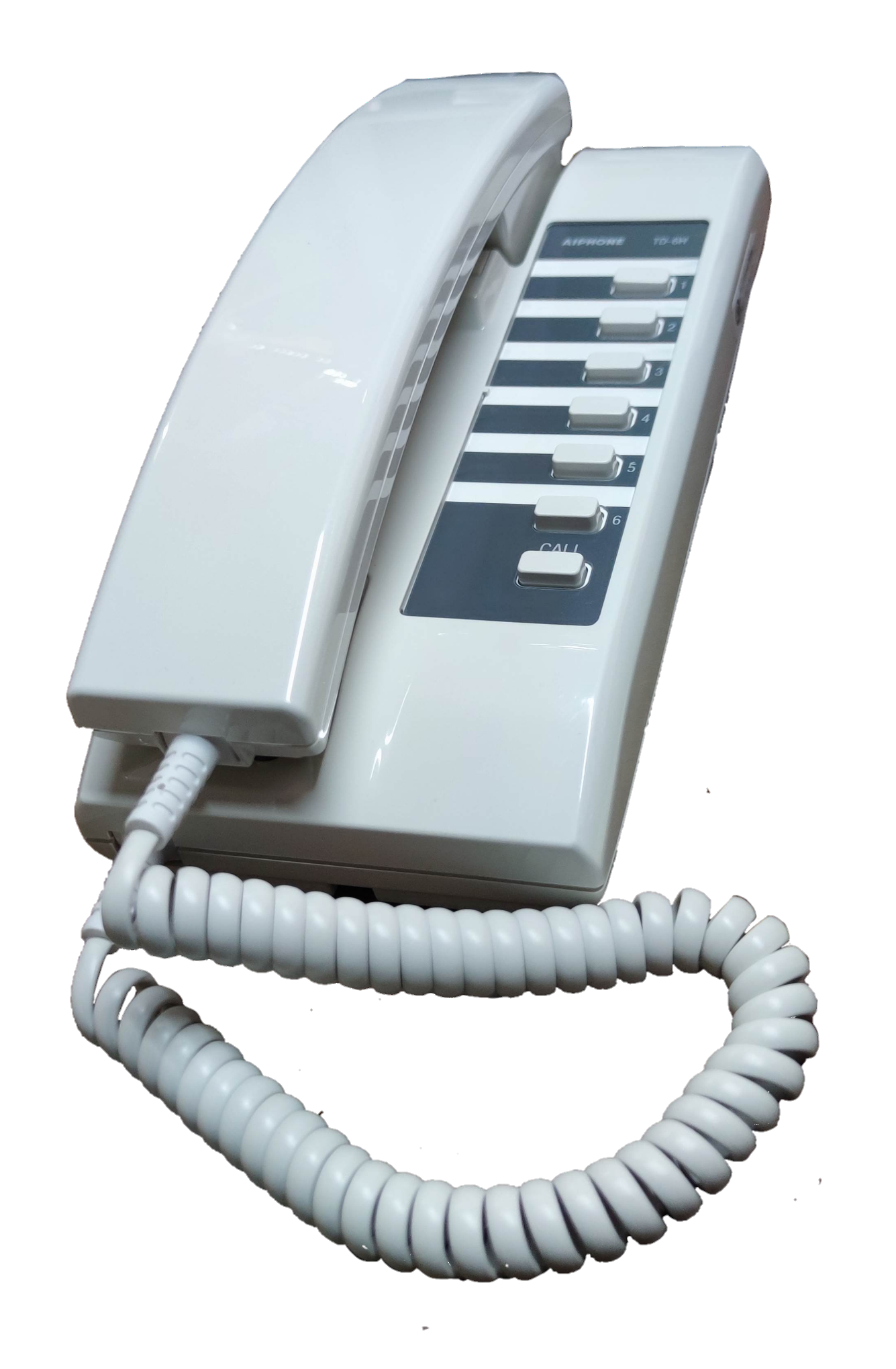 Aiphone 6 station intercom system white handset with coiled cord and multiple buttons for communication