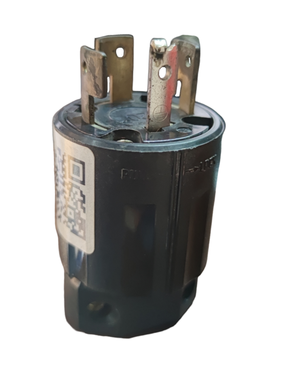 Close-up of American Denki 20A twist lock plug with metal prongs and black casing