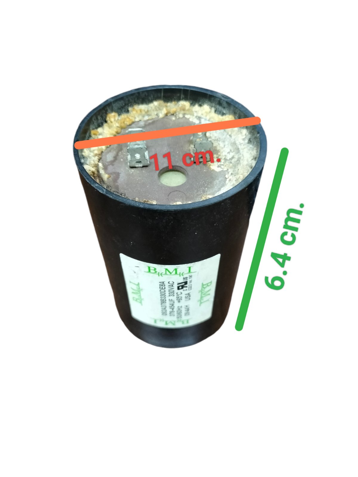 BMI 378-454UF starting capacitor black cylindrical electrical component with dimensions 11 cm by 6.4 cm