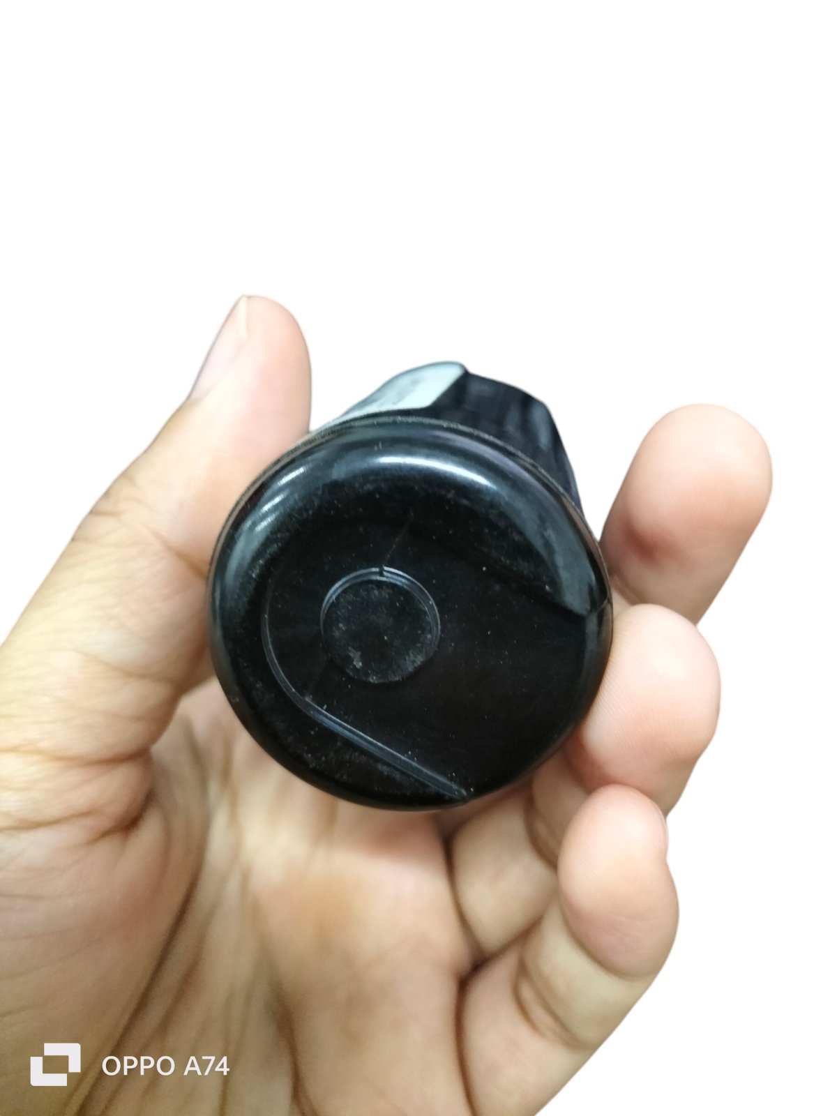 BMI Starting Capacitor 18-22UF 250V black round plastic motor start capacitor held in hand