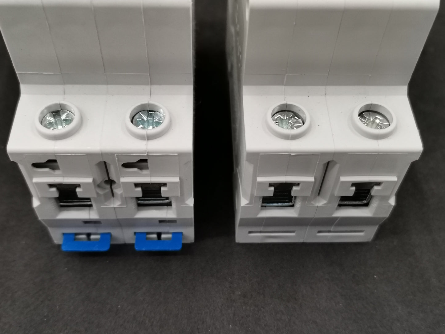 Chint 63A 2 pole miniature circuit breaker white electrical component with blue toggle switches