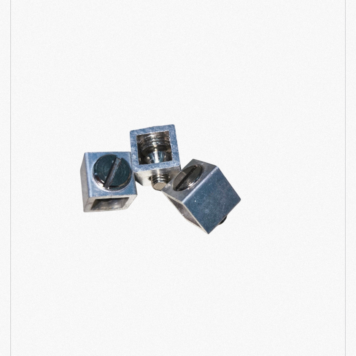 GE and Koten circuit breaker bolt on lugs in metallic finish with screws for electrical connections