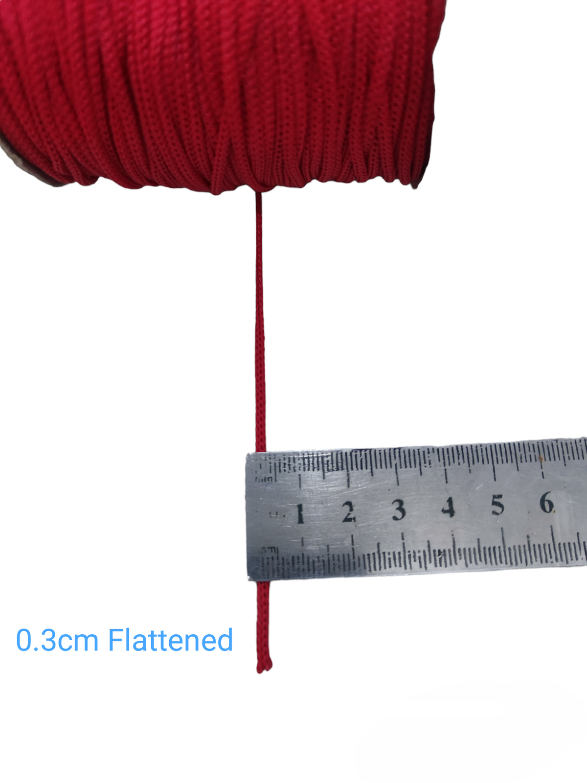 Red cloth rope measuring approximately 0.3 cm flattened with metal ruler Cloth Rope - Per Meter
