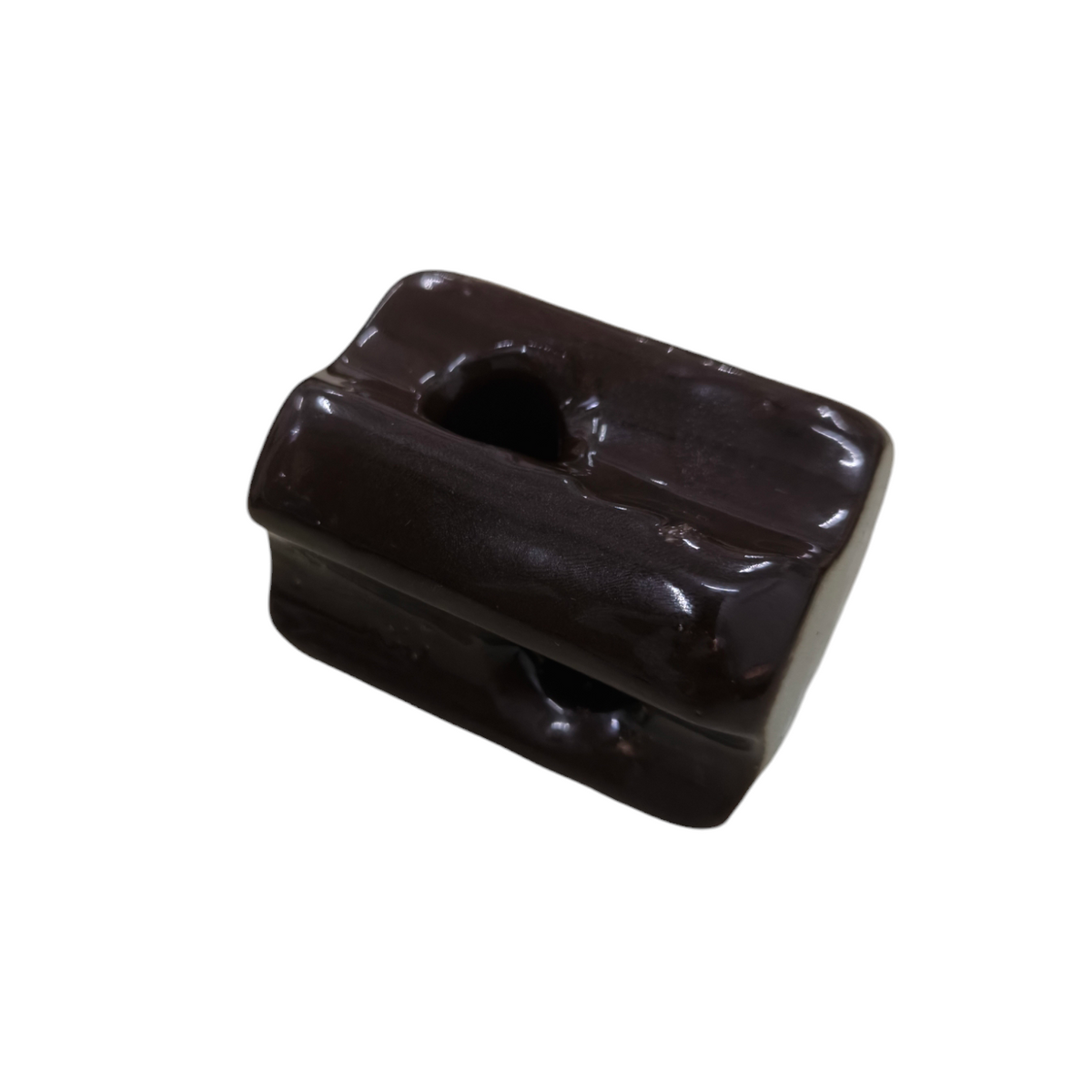 Local electrical ball insulator in dark brown for electrical circuitry and parts