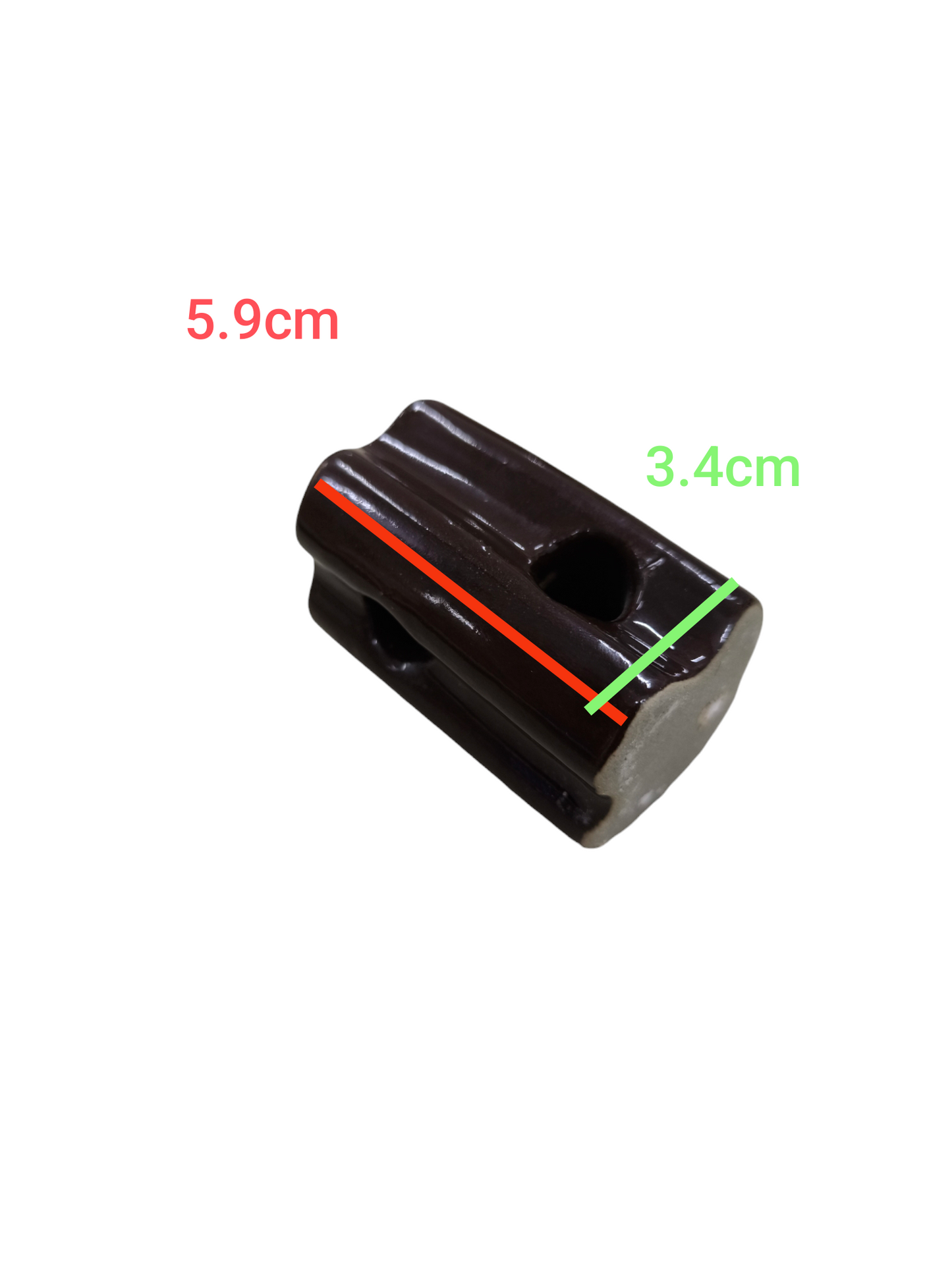 Local electrical ball insulator with 5.9 cm length and 3.4 cm width in dark ceramic material