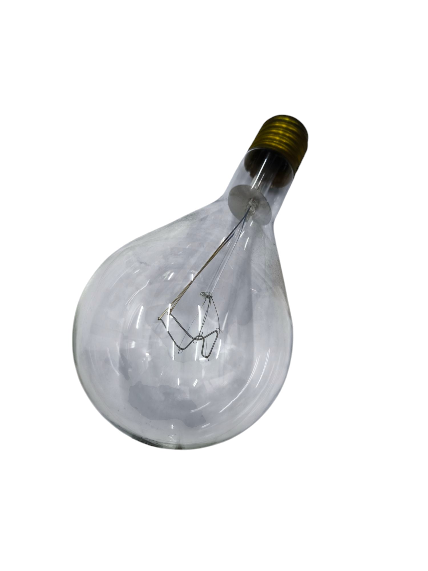 Clear GE 500W incandescent lamp with brass base and visible filament inside