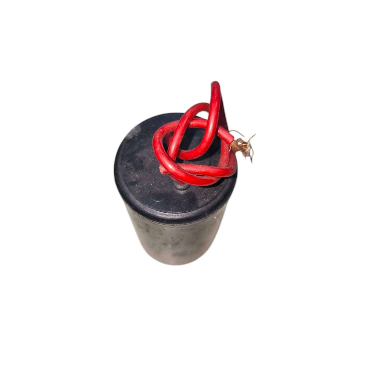 CBB 10uF 450V capacitor with black cylindrical body and red insulated wires for electrical circuits