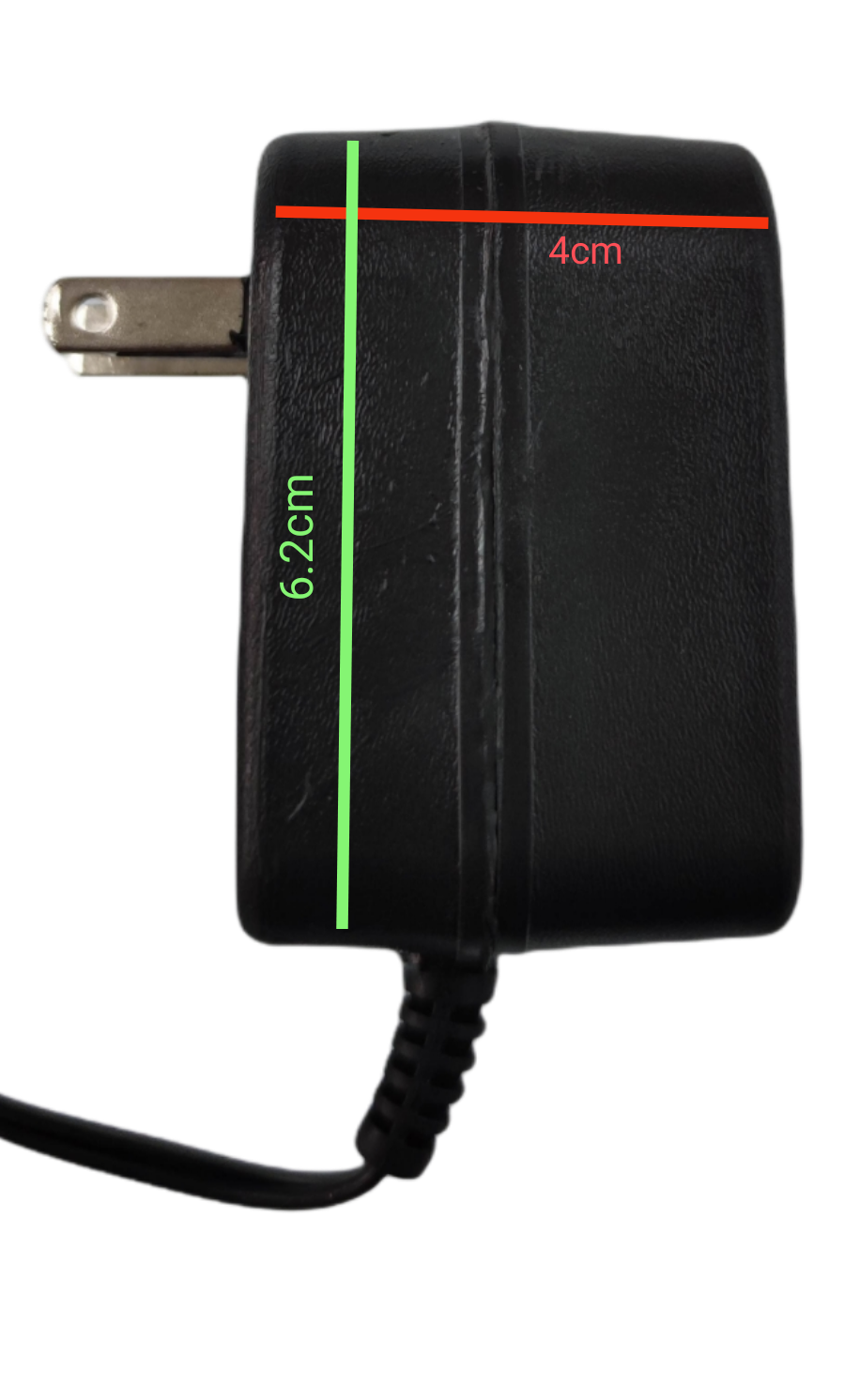 Black wall charger measuring 6.2cm by 4cm cell phone charger for Ericson old mode