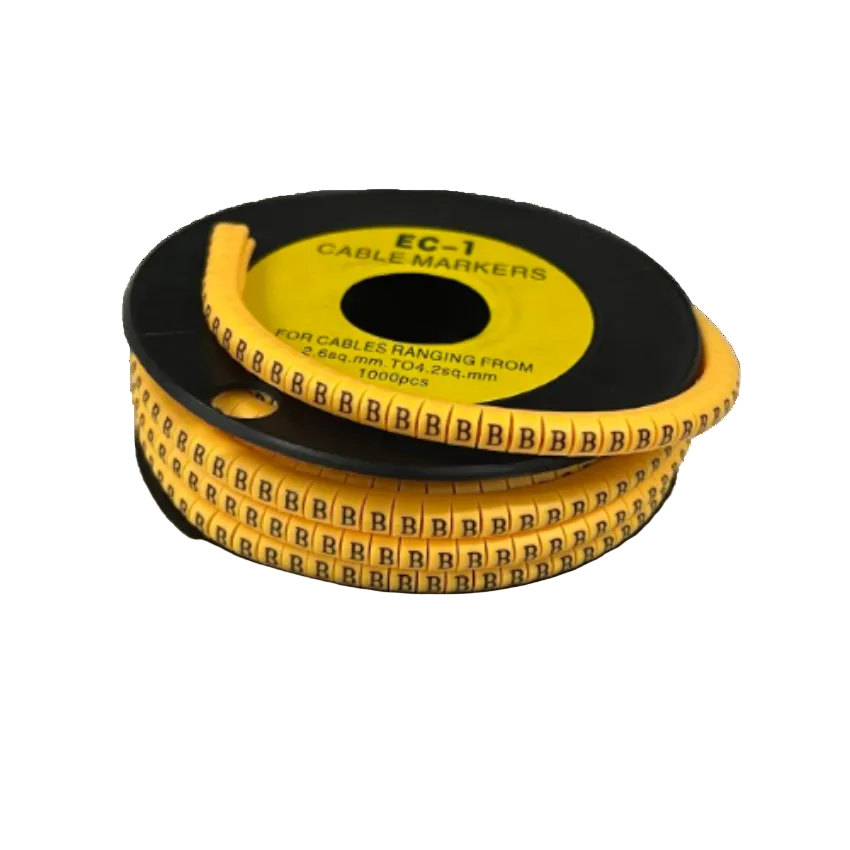 Cable Marker - B Yellow reel of adhesive cable labels on black spool for cable management and identification