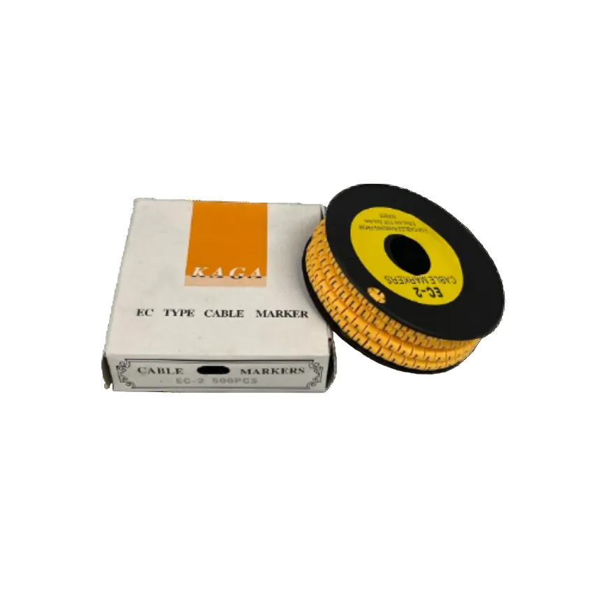 Cable Marker L - Yellow spool of EC type cable markers beside white KAGA box for wire labeling
