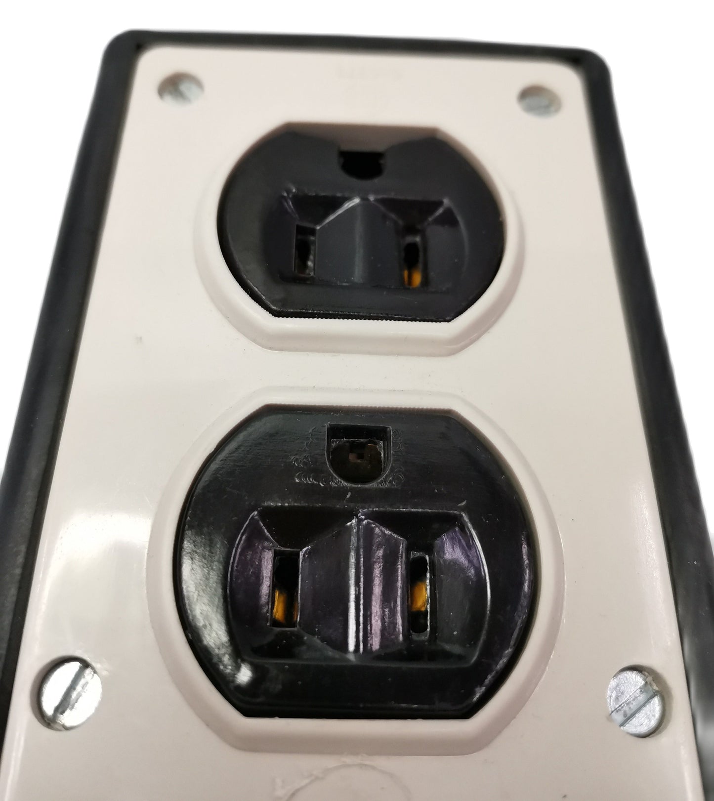Kopez 4 gang rubber electrical outlet with two black plug sockets on white panel