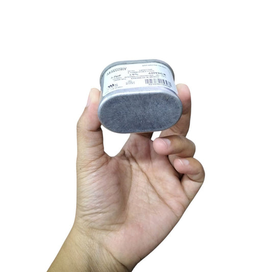 Mallory 3UF 440V oil-filled capacitor held in hand, compact design with detailed label