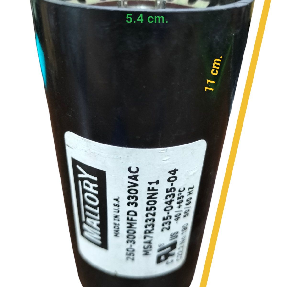 Mallory Capacitor 250-300 MFD 330 VAC black cylindrical electrical component with label