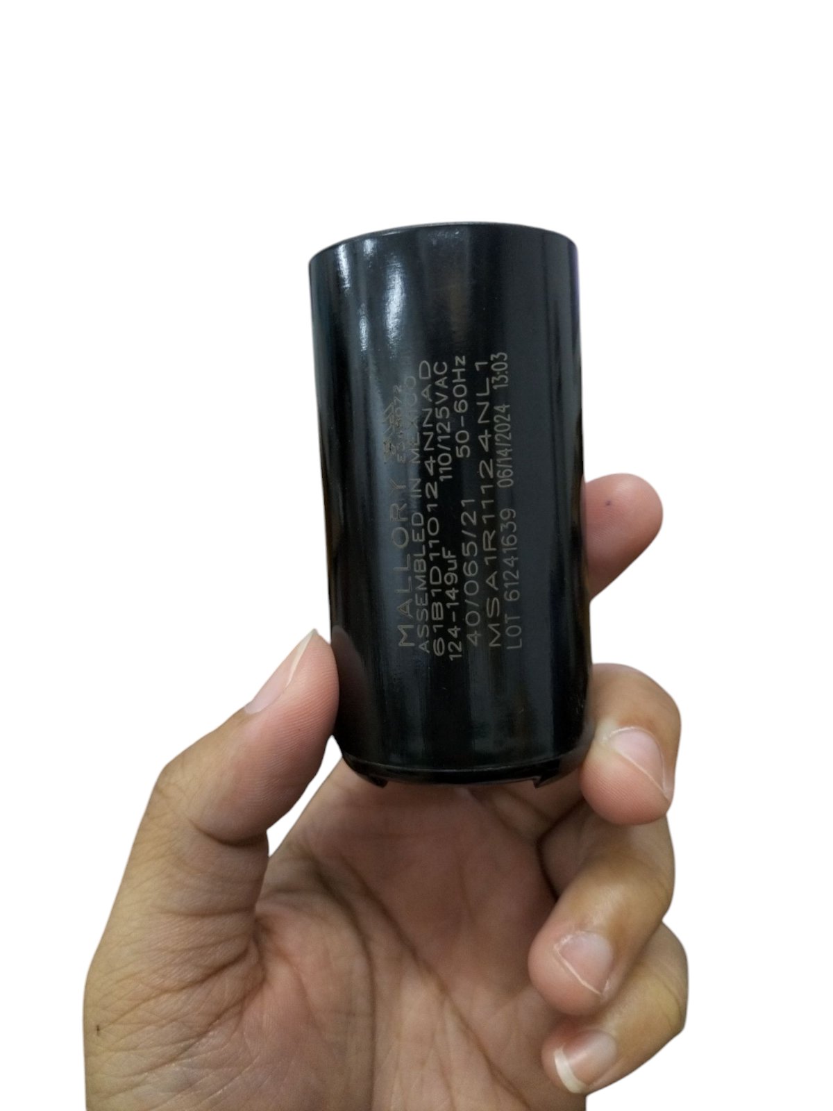 Mallory black cylindrical motor capacitor fingers for electrical circuitry use
