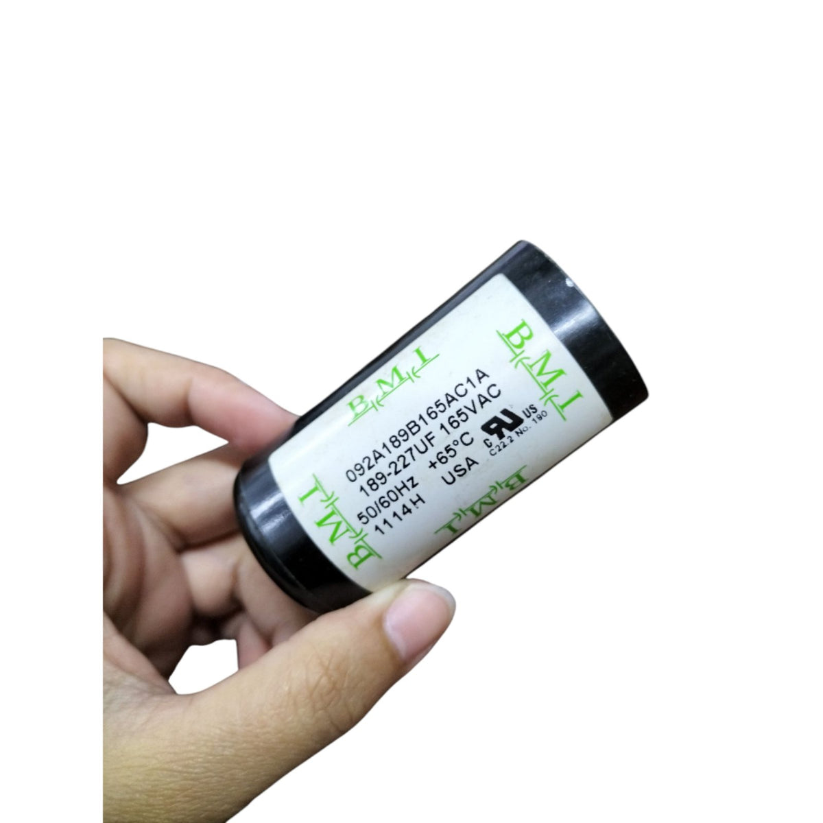 BMI Motor Start Capacitor 189-227uF in a hand, ideal for electrical circuit applications