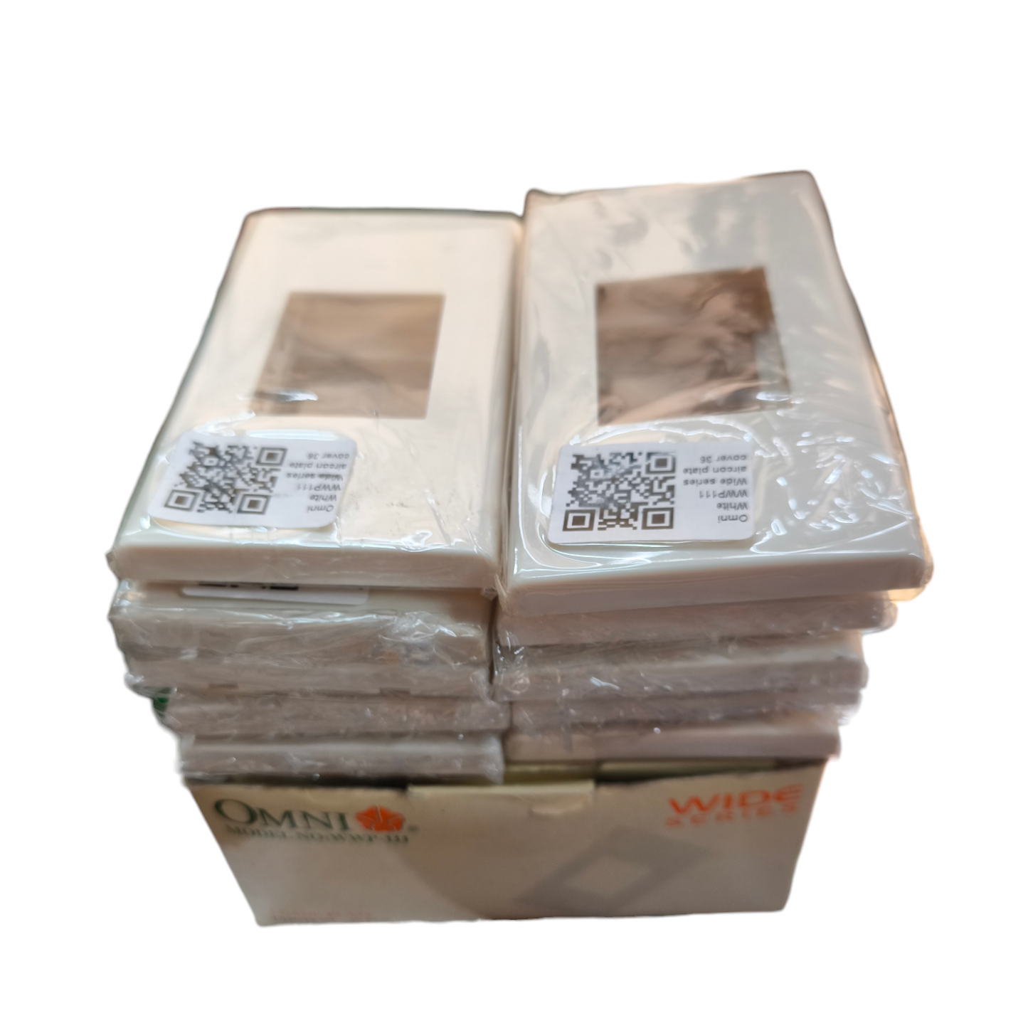 Stack of Cover Wide Series Omni WWP-111 power point switch and plug covers in white packaging