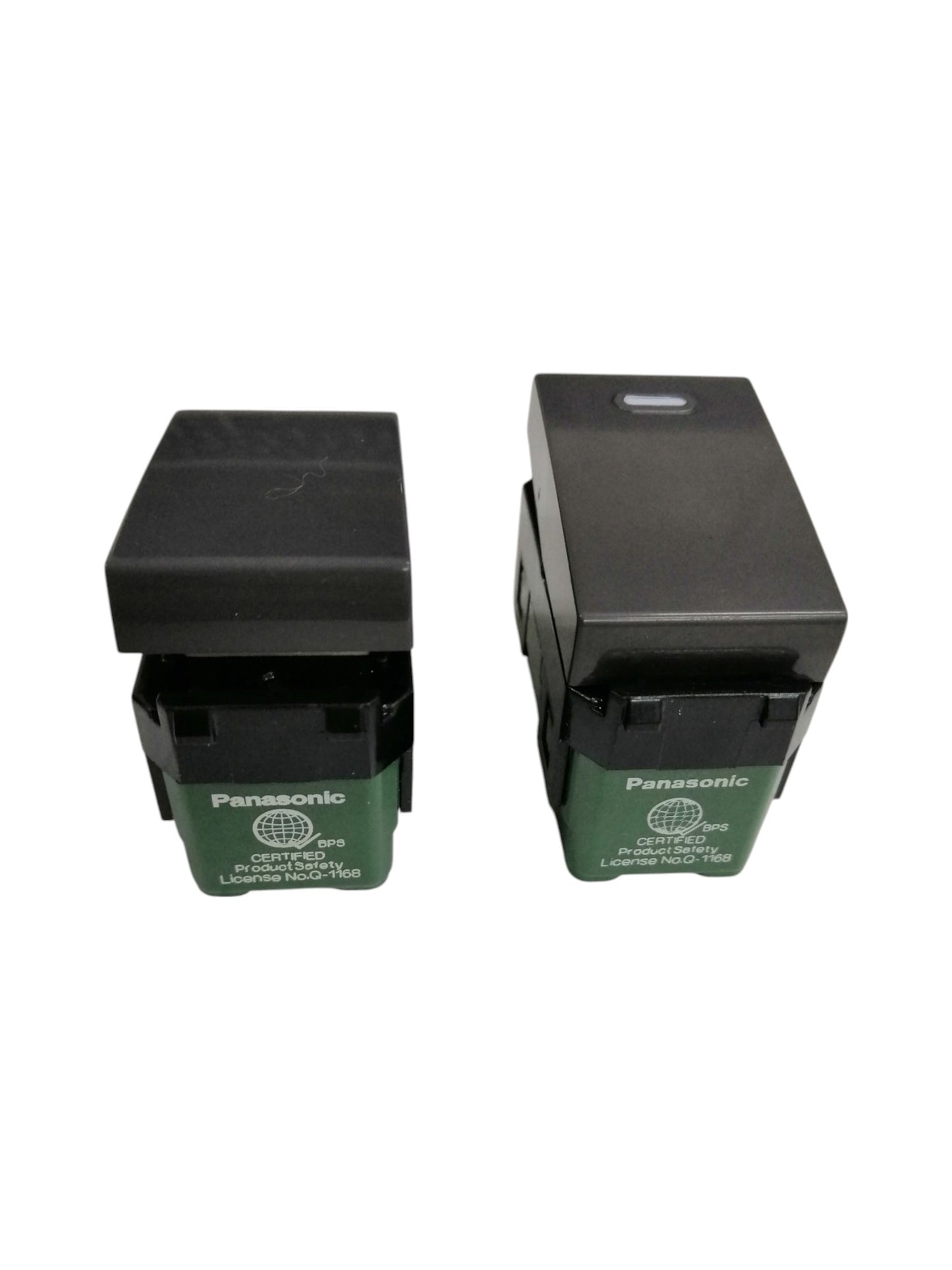 Panasonic 3 gang switch in black with green base for power points and electrical wiring