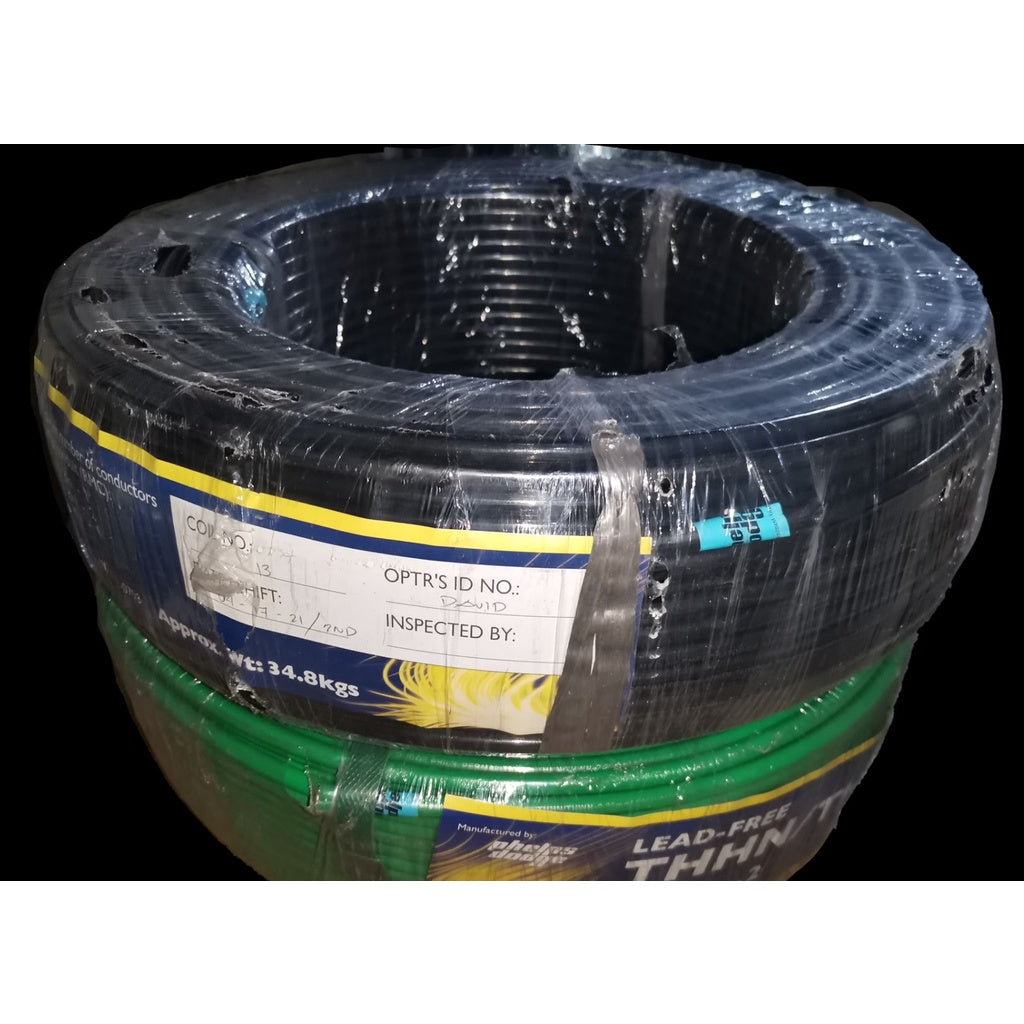 Coiled Phelps Dodge electrical wire 60mm wrapped in plastic packaging for construction use