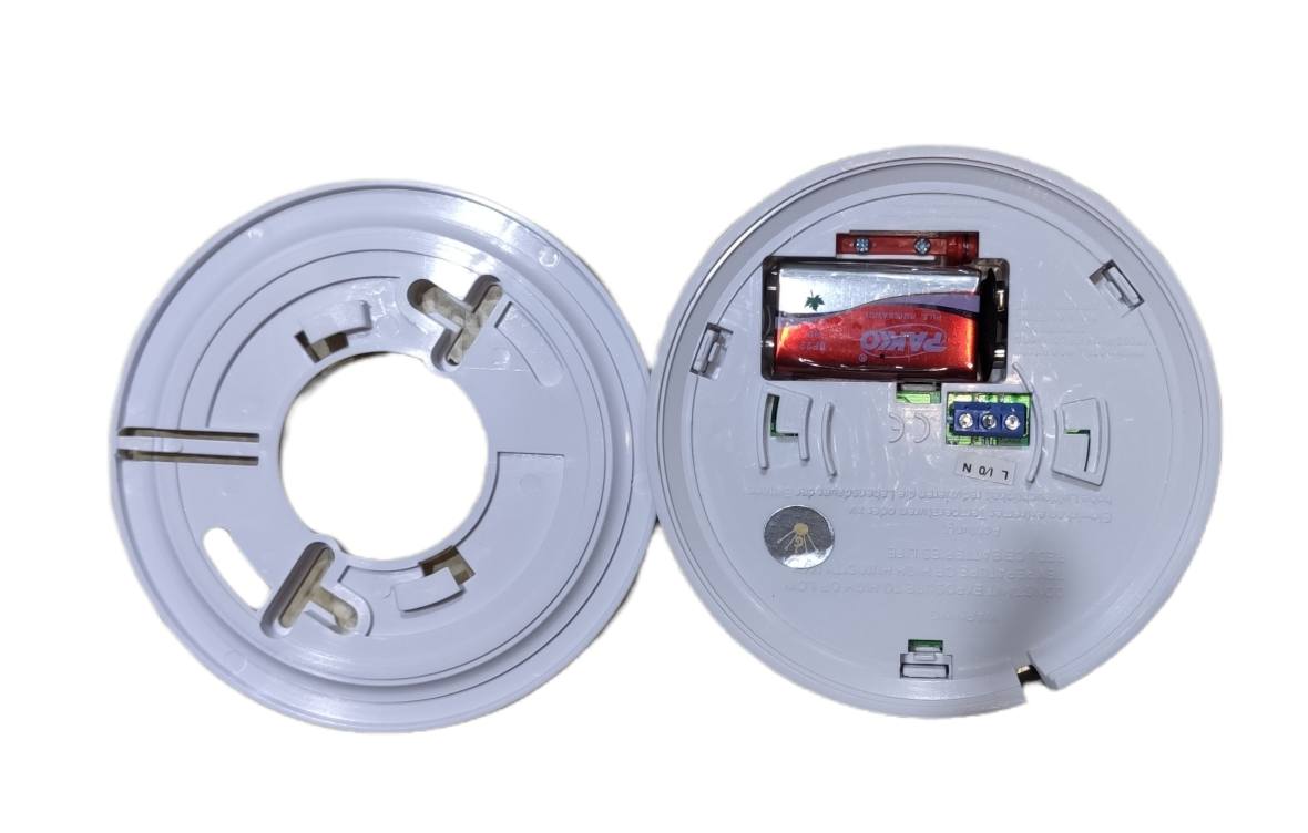 Potric photoelectric smoke alarm 9V with battery compartment and mounting base shown open