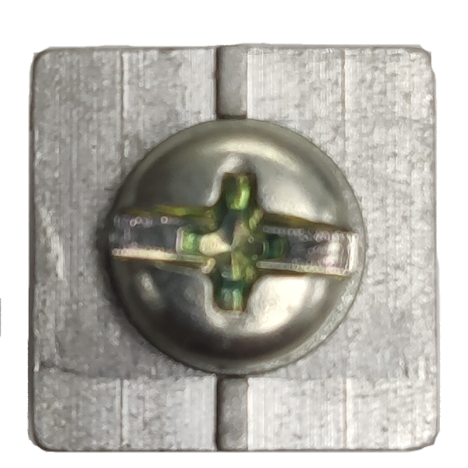 Close-up of Schneider Mechanical Lugs metal electrical part with central screw for secure connections