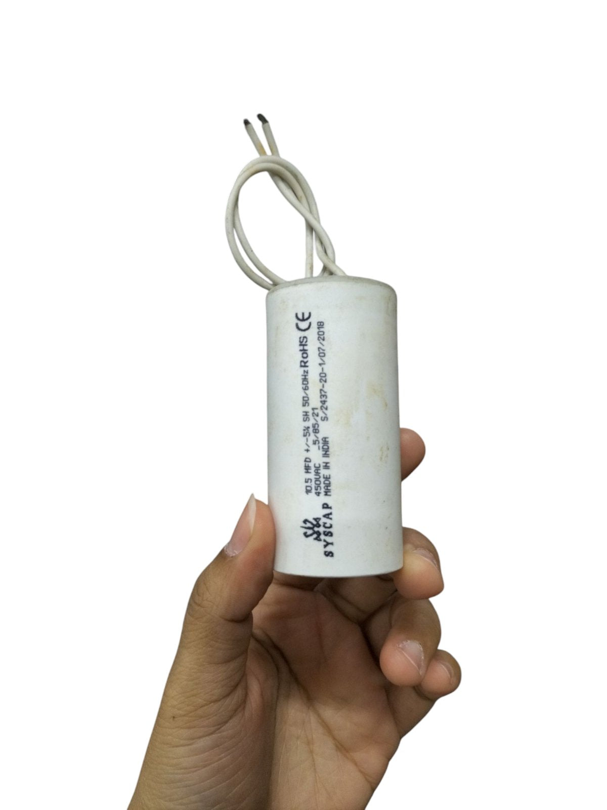 Syscap 10.5MFD 450 VAC Running Capacitor held in hand for electrical circuitry and parts