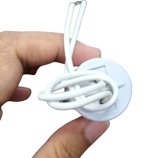 Syscap 1MFD 450V AC Running Capacitor held in hand with white wires attached