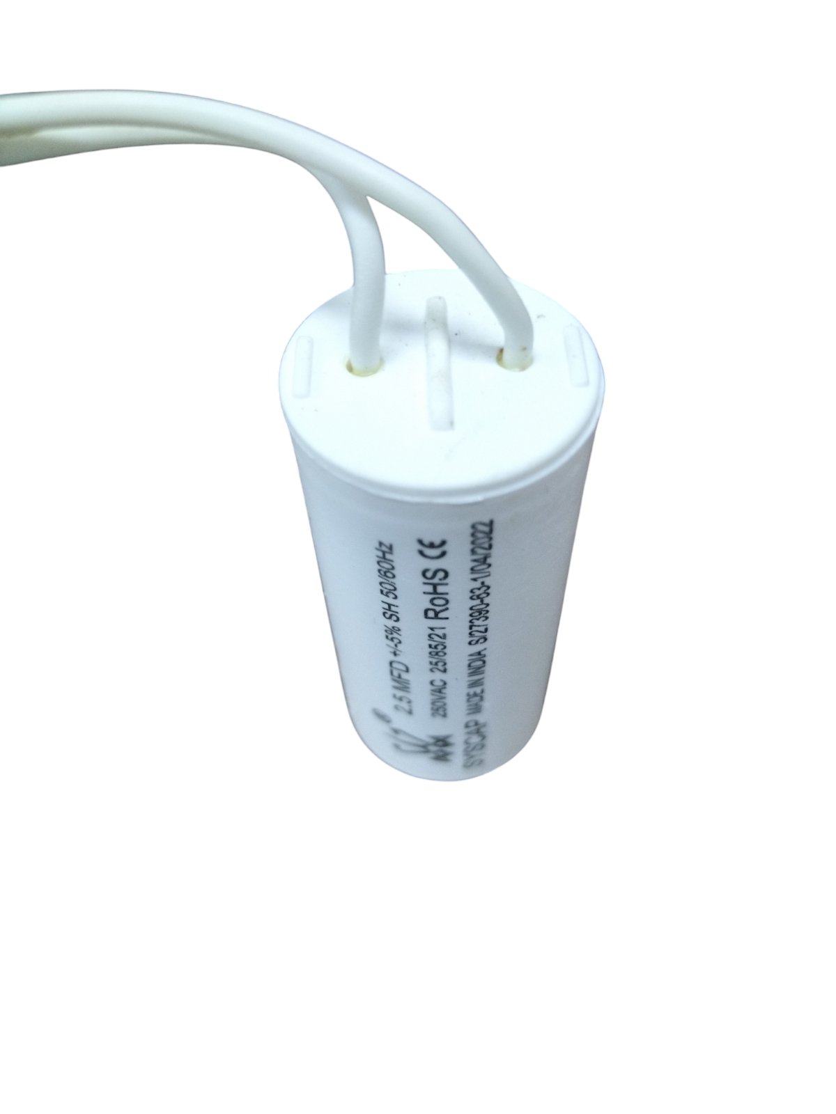Syscap 2.5MFD motor running capacitor white cylindrical electrical component with attached wires