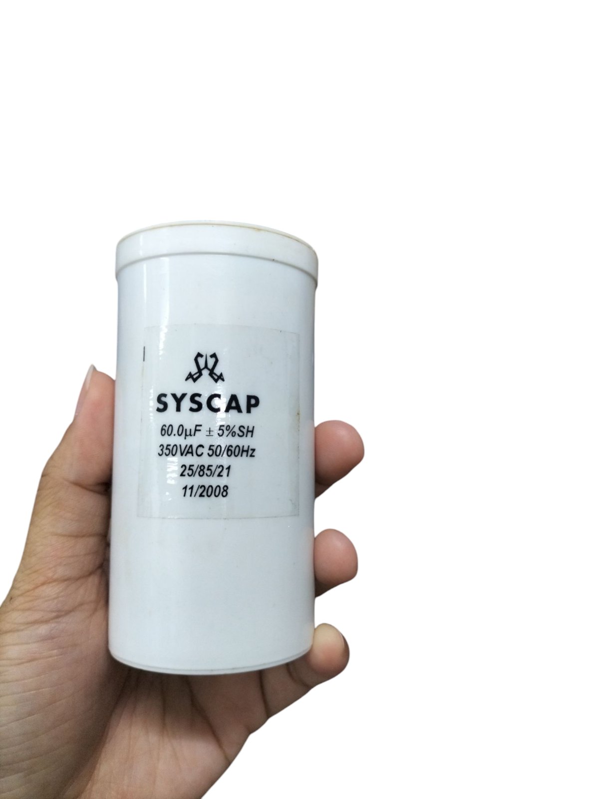 Syscap 60MFD 350V AC Running Capacitor white cylindrical electrical component held in hand