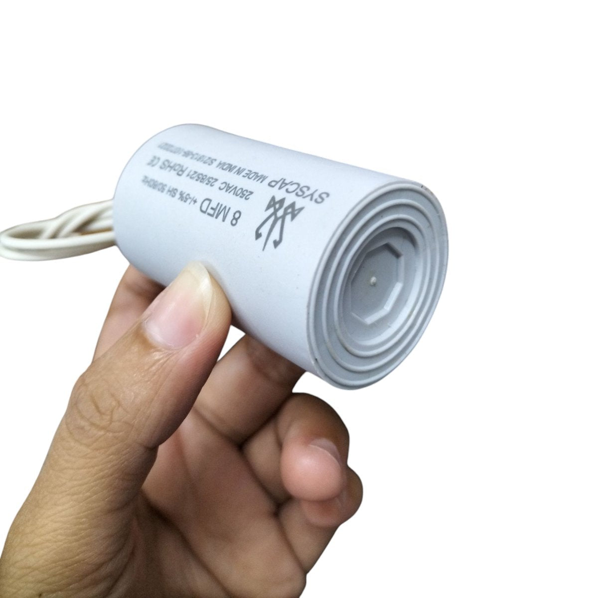 Syscap 8MFD 250 VAC Running Capacitor in Hand for Electrical Applications