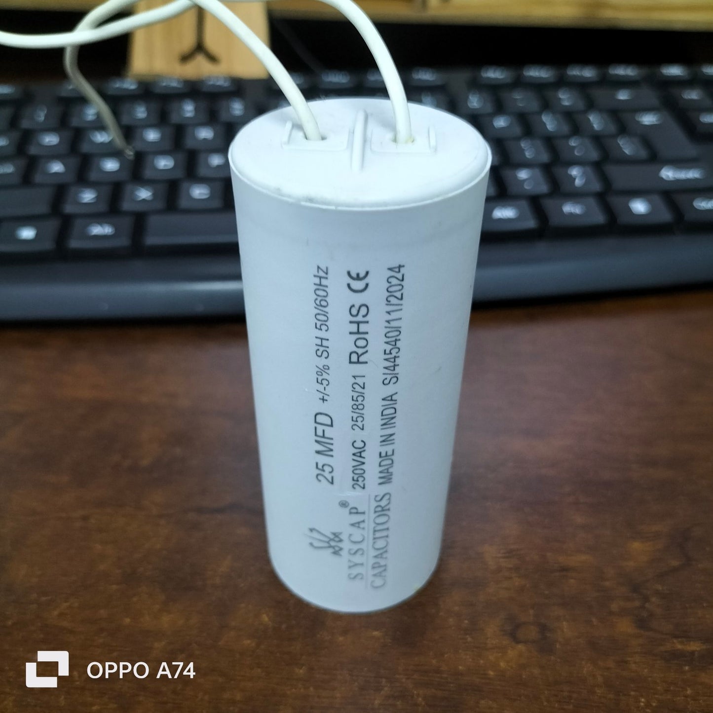 Syscap electrical motor capacitor 25 MFD 250VAC with white wires for electrical circuitry