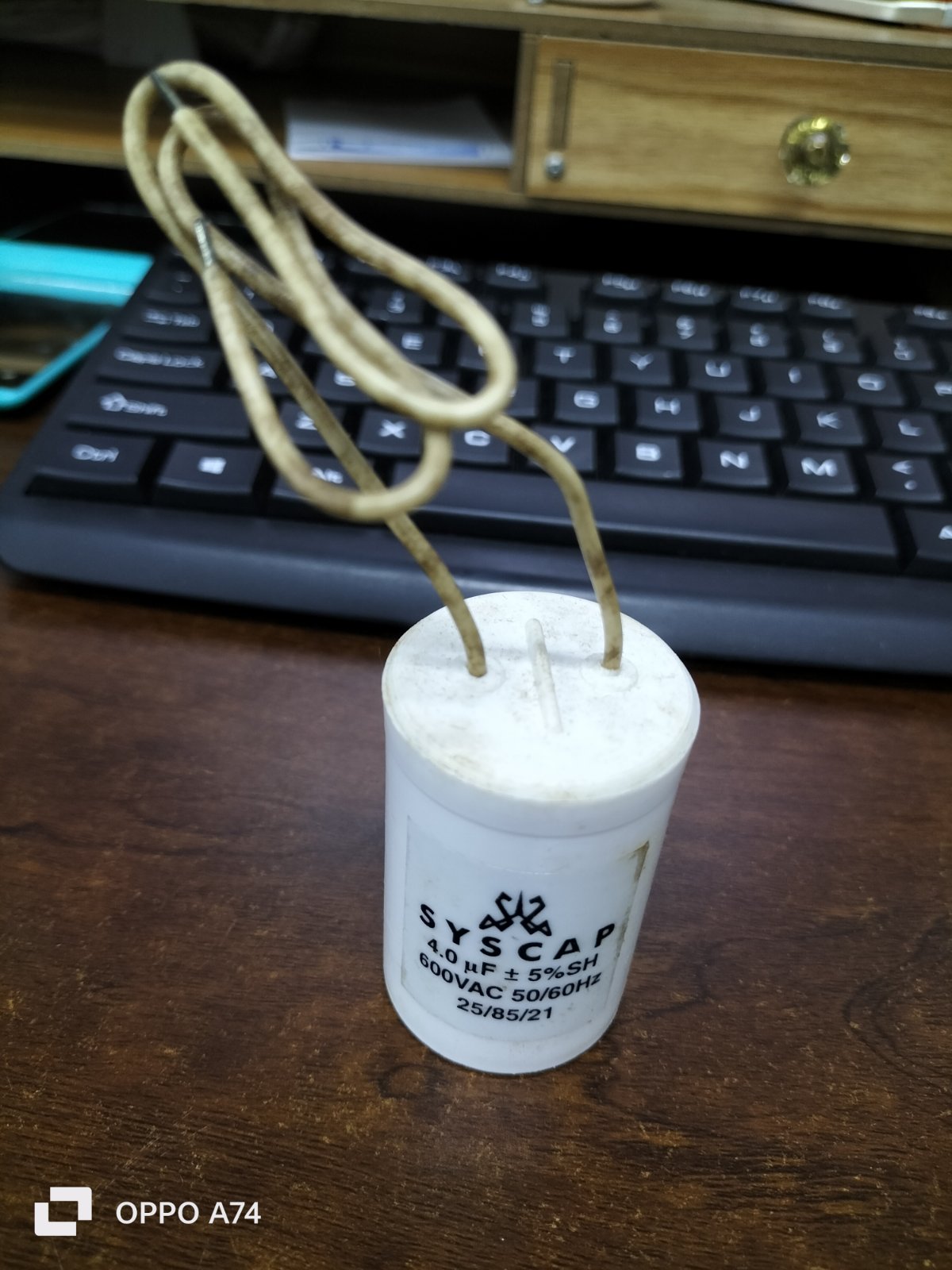 Syscap motor capacitor with two attached wires